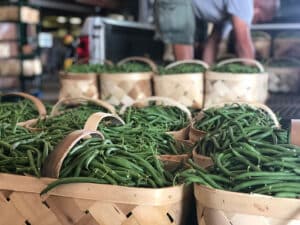 Baskets full of white runner beans