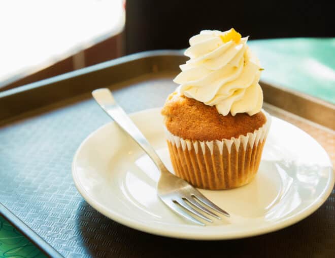 peach cupcake with peach cream cheese frosting